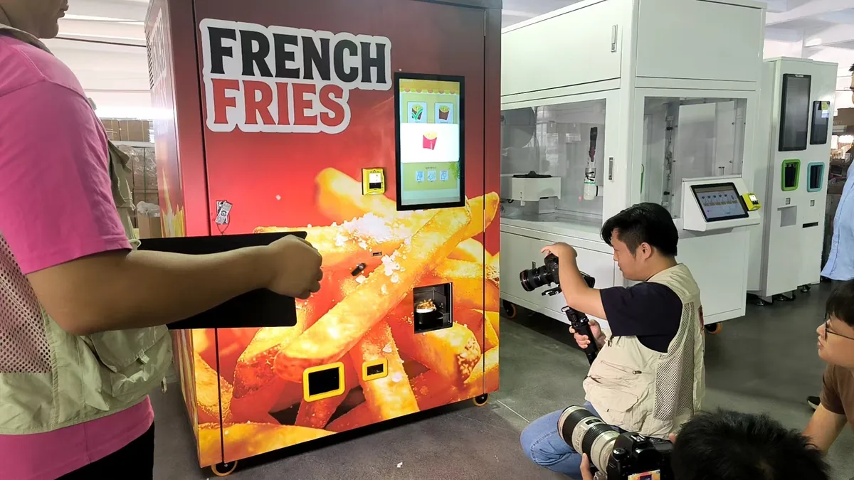 Before You Buy a Smoothie Machine, Take a Look Inside This 27-Year-Old Jiangmen Factory 3 Today Lingnan crew filming french fries vending machine, Hommy Jiangmen factory